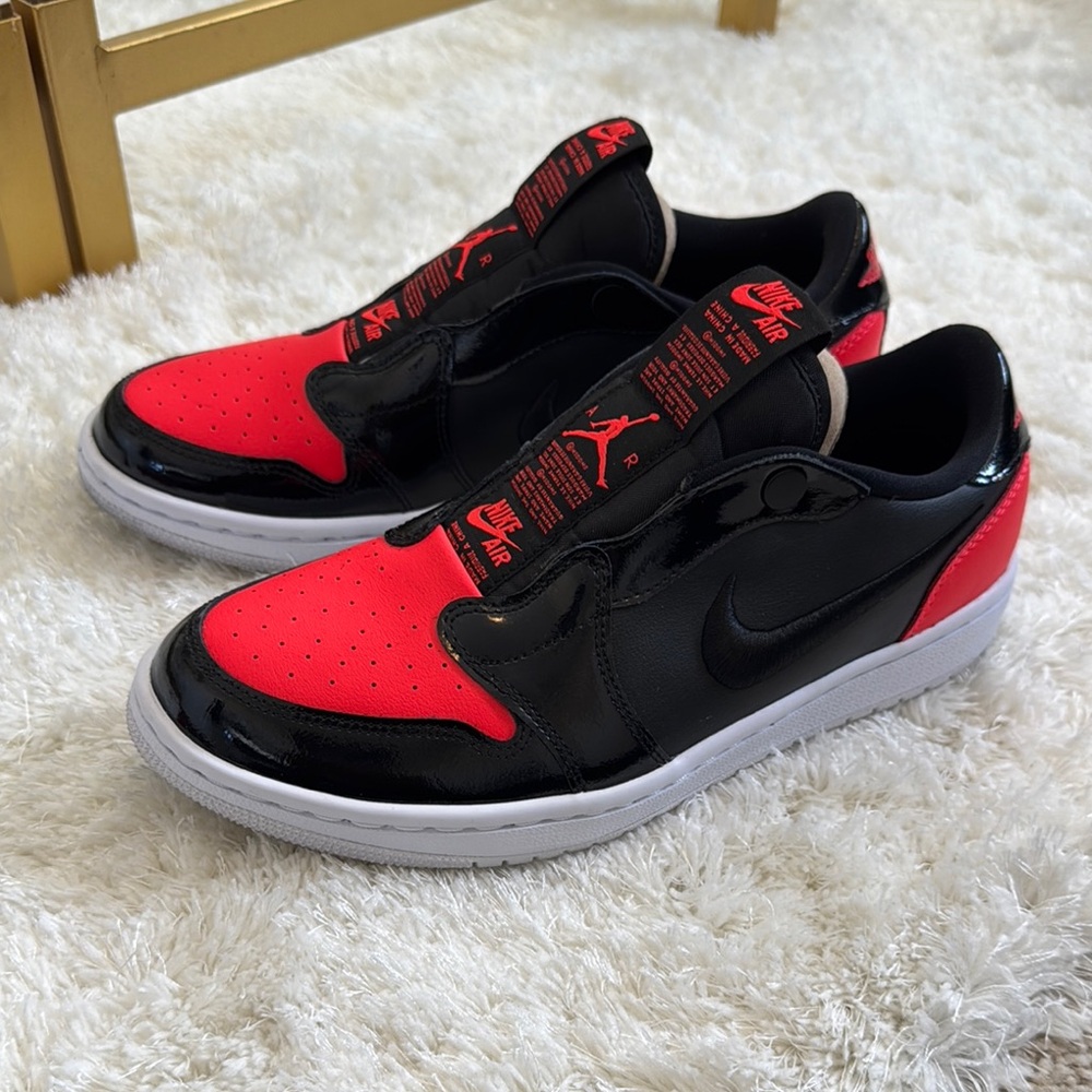 Jordan Black and Orange Low-Top Sneakers with buttons and patent leather